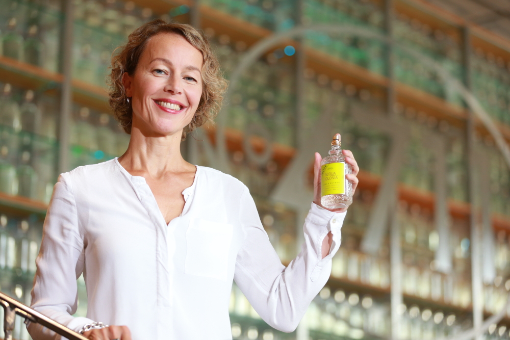 Alexandra Kalle with a bottle of Aqua Colonia