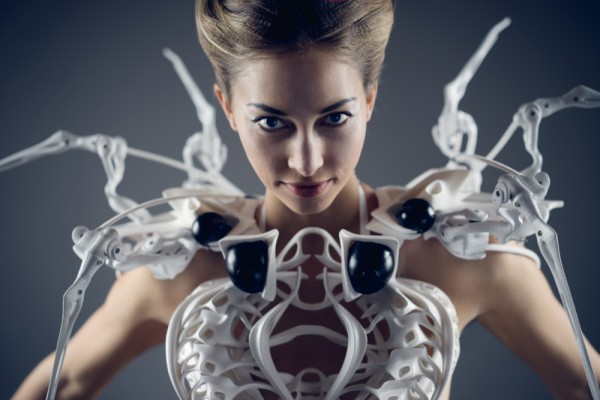Spider Dress 2.0: "Sensors and moveable arms on the dress help to create a more defined boundary of personal space while employing a fierce style. This robotic dress attacks when you come to close" (artist's website) | Created by Anouk Wipprecht for Intel, with Philip H. Wilck.