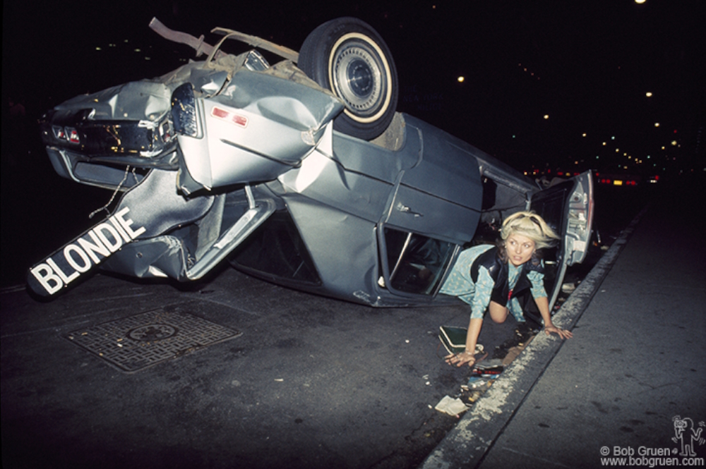 Debbie Harry, lead singer of American Rock and New Wave band Blondie. Shooting took place in a wrecked car on 6th Avenue and 50th Street, NYC. September 1976.