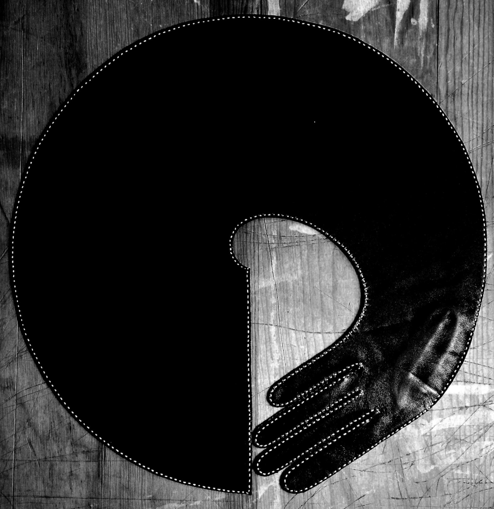 'Circle' (Sculptural glove , black lambskin leather, hand sewn).