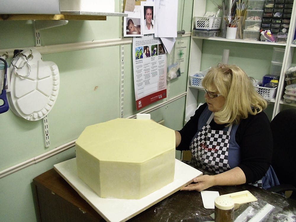 Dawn Blunden finishing the marzipaning on a cake