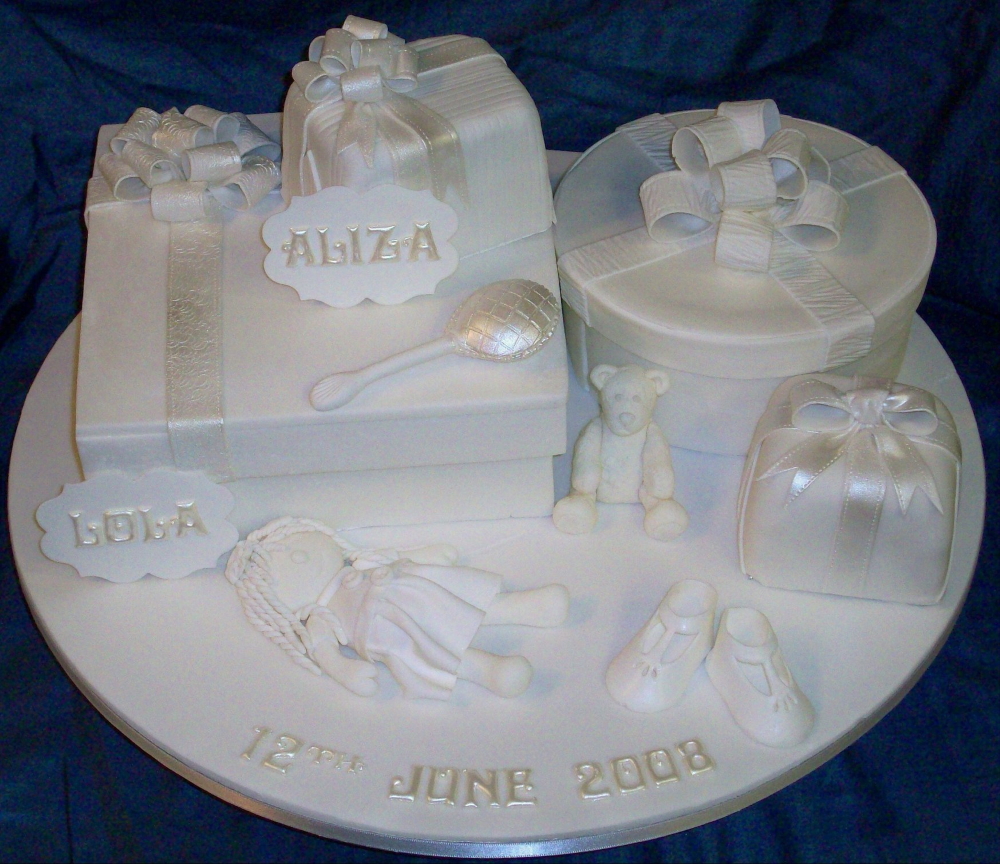 Pure white cake for the christening of the Duchess of Cornwall's two granddaughters. 