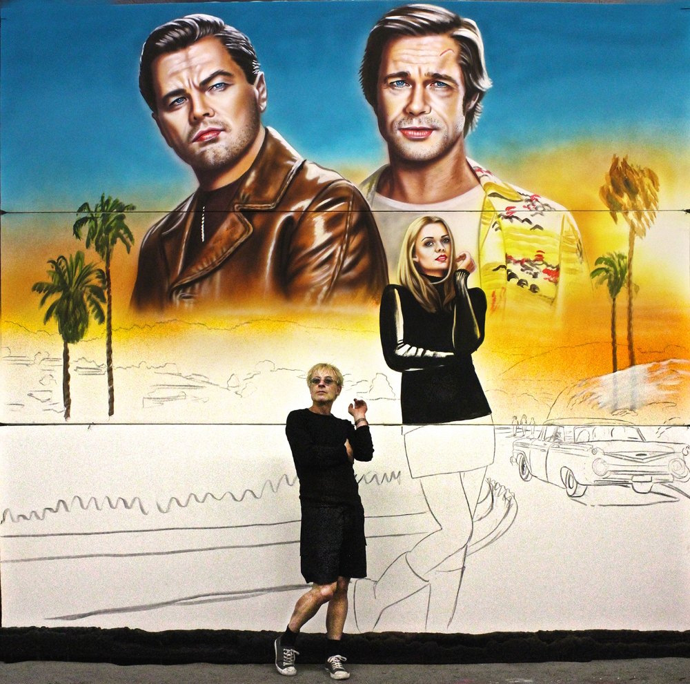 'Once upon a Time in Hollywood': Goetz Valien posing as actress Margo Robbie in front of his billboard in the works for Quentin Tarantino's 2019 comedy-drama film featuring Brad Pitt and Leonardo Di Caprio.