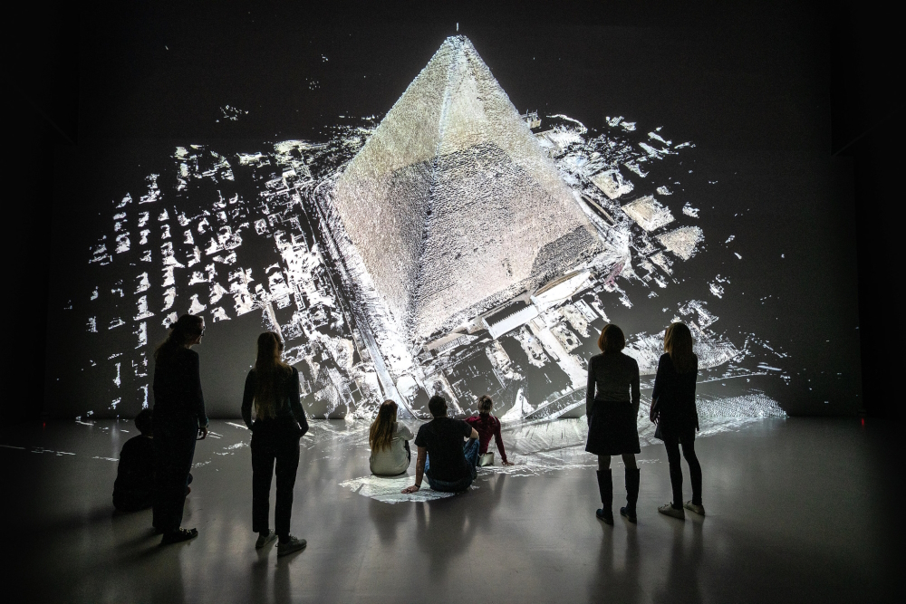 'The Great Pyramid in 3D', from the BBC Series Ancient Invisible Cities explores possibilities of virtual archaeology by scanning and digitally rebuilding historical architecture – in this case, the Great Pyramid of Giza. In this unique form of presentation, visitors can choose between different paths to explore the ancient structure, moving interactively in a 3D environment with stereoscopic 360° video at 12K resolution. The experience is enhanced by a specially created soundtrack and live expert commentary.
