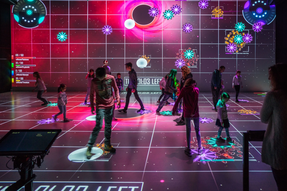 'Game Changer Suite' is a collection of multiplayer games that were developed as prototypes by students at the Upper Austria University of Applied Sciences’ Hagenberg Campus. The accent in Game Changer is on exploring cooperative and competitive game playing. The gamers moving about in Ars Electronica Center’s Deep Space 8K are registered by means of laser tracking, which enables them to control their virtual avatars projected onto the space’s wall and floor.