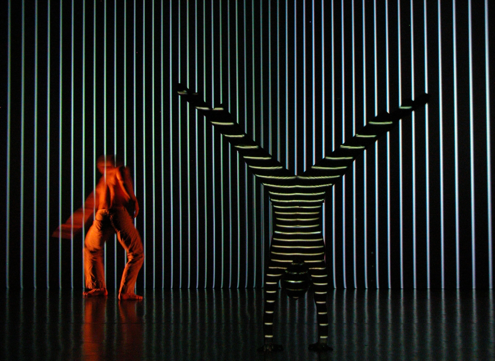 'Apparition' is a compelling dance and media performance for the stage that successfully integrates interactive sensor and tracking technology in innovative ways to give the dancer the possibility to interact with and control the image and the musical environment. A project of the award winning composer and media artist Klaus Obermaier (AT) in cooperation with Ars Electronica Futurelab (AT).