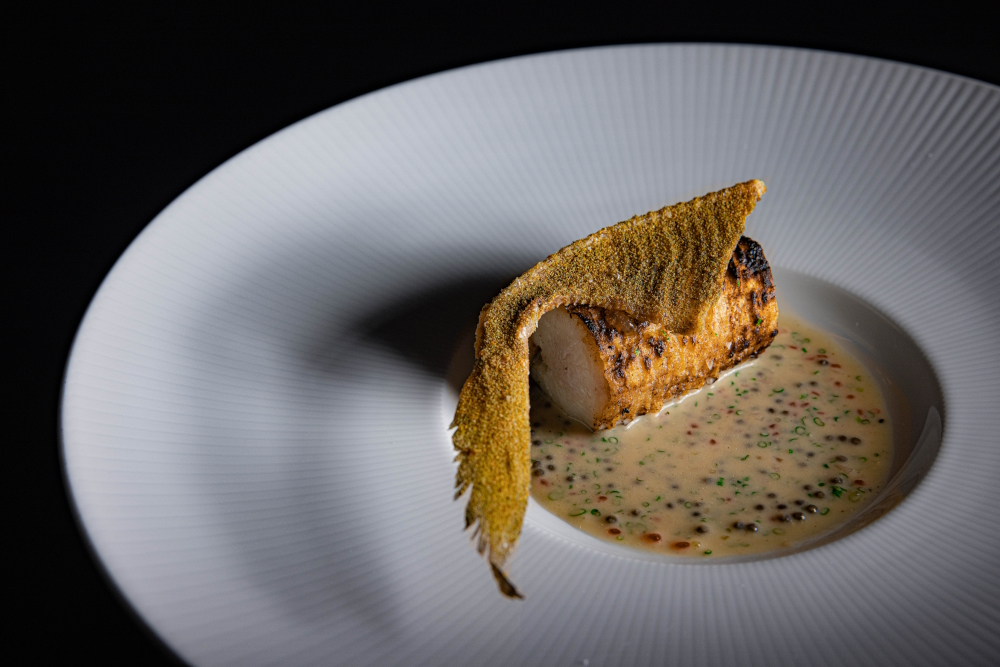 Pomfret skeleton & pomfret w/ tom yam sauce