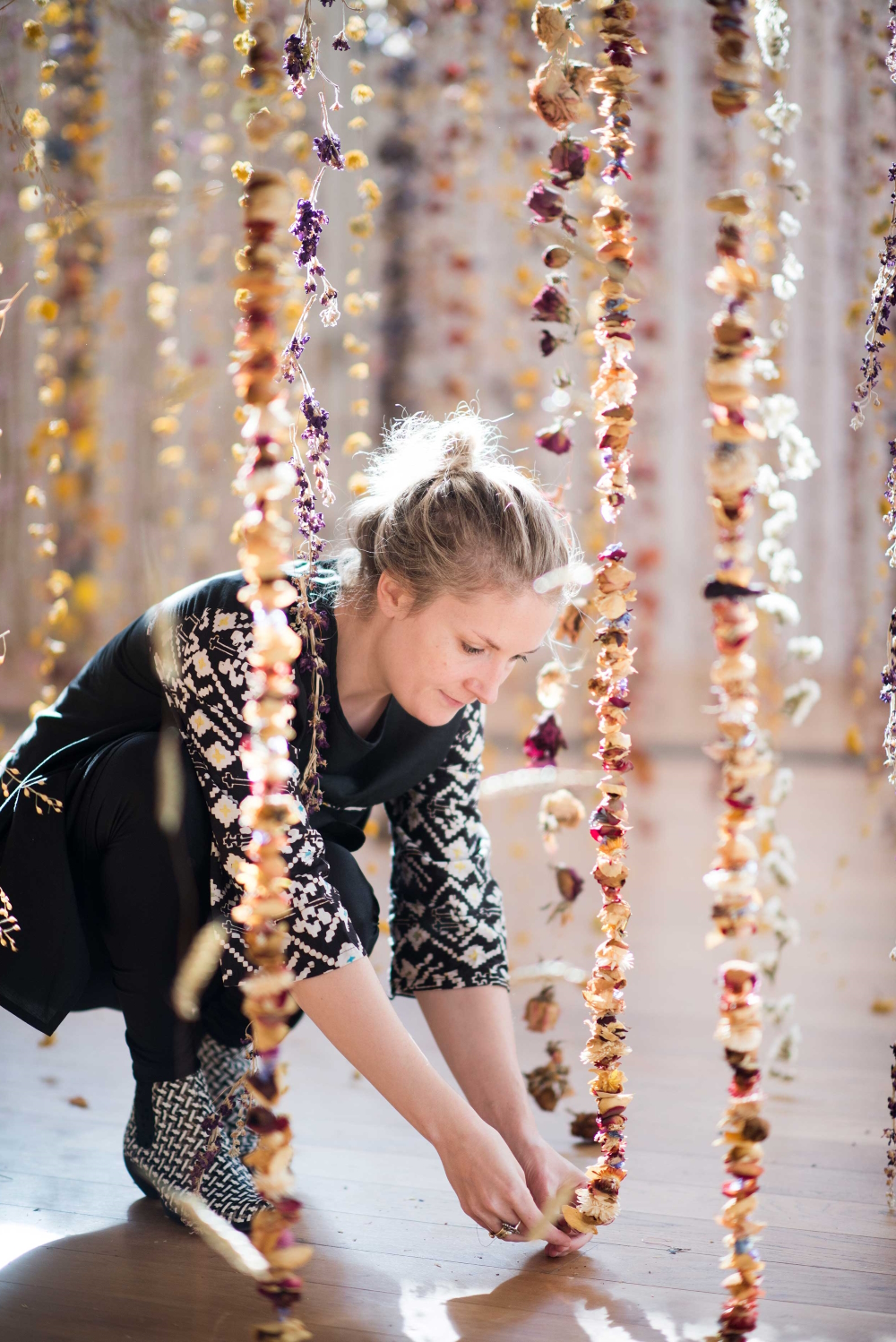 Rebecca Louise Law entwinds every single flower with a thing copper wire.