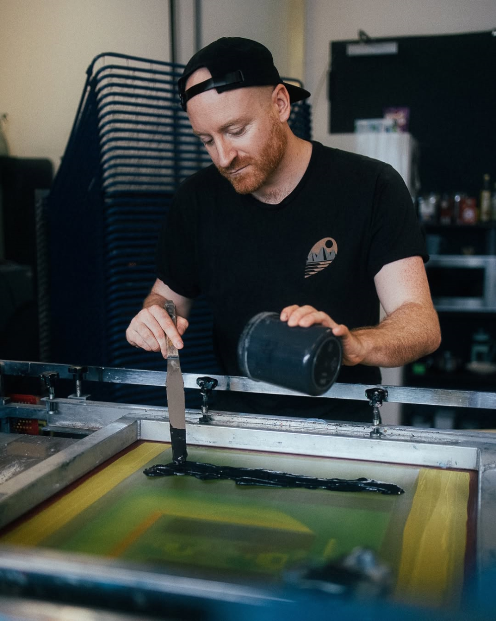 Simon Marchner can rely on fundamental craftmanship and tact when working with waterbased colors only on his silkscreen printer.