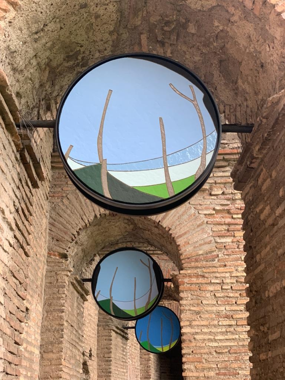 'Un giorno alle mura romane: ore 8:00' on display at Rome's Museo dello Mura. In the roundels of his exhibition 'Tra le mura' ('Between the Walls') Stefano Lazzari 