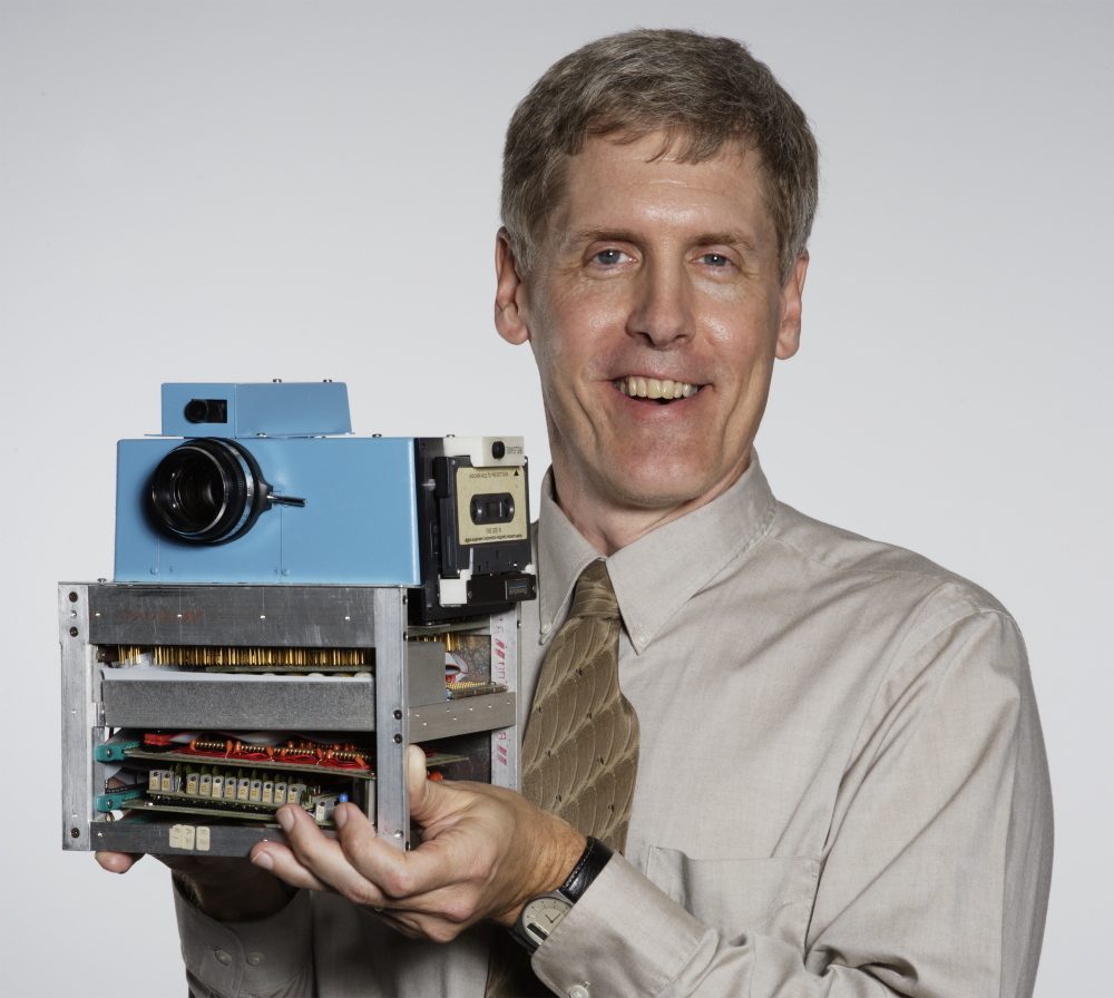 Steve Sasson and his invention, the digital camera's prototype